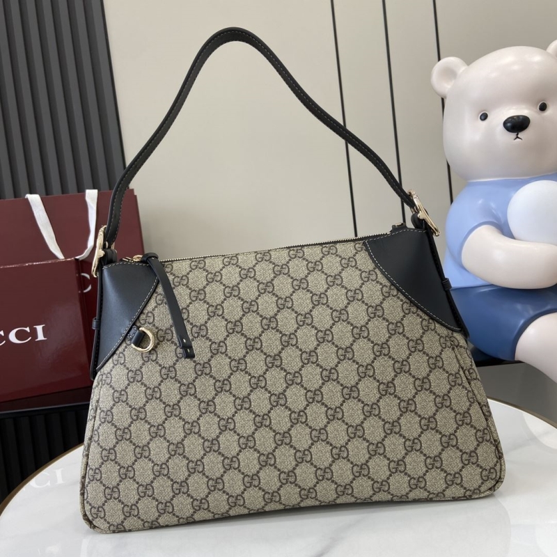 G*u*i top handle bags